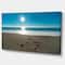 Designart - Blue Sea and Footprints in Sand - Large Seascape Art Canvas Print